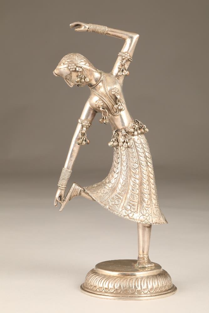Indian silver figure of a dancing girl, (marked silver to base) circ 1920's. 26cm high