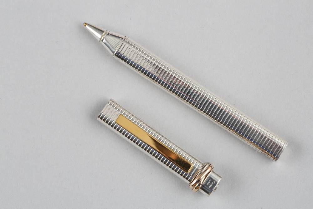 Must de Cartier silver and gilt biro pen, boxed in a presentation case with guarantee card and - Image 3 of 3