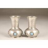 Pair of Ashberry pewter vases with ceramic roundel decoration. 13cm high