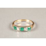 18ct gold emerald and diamond ring, three radiant cut emeralds interspersed by two radiant cut