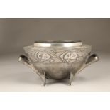 Archibald Knox English Pewter rose bowl with stylised handles and a band of stylised honesty seed