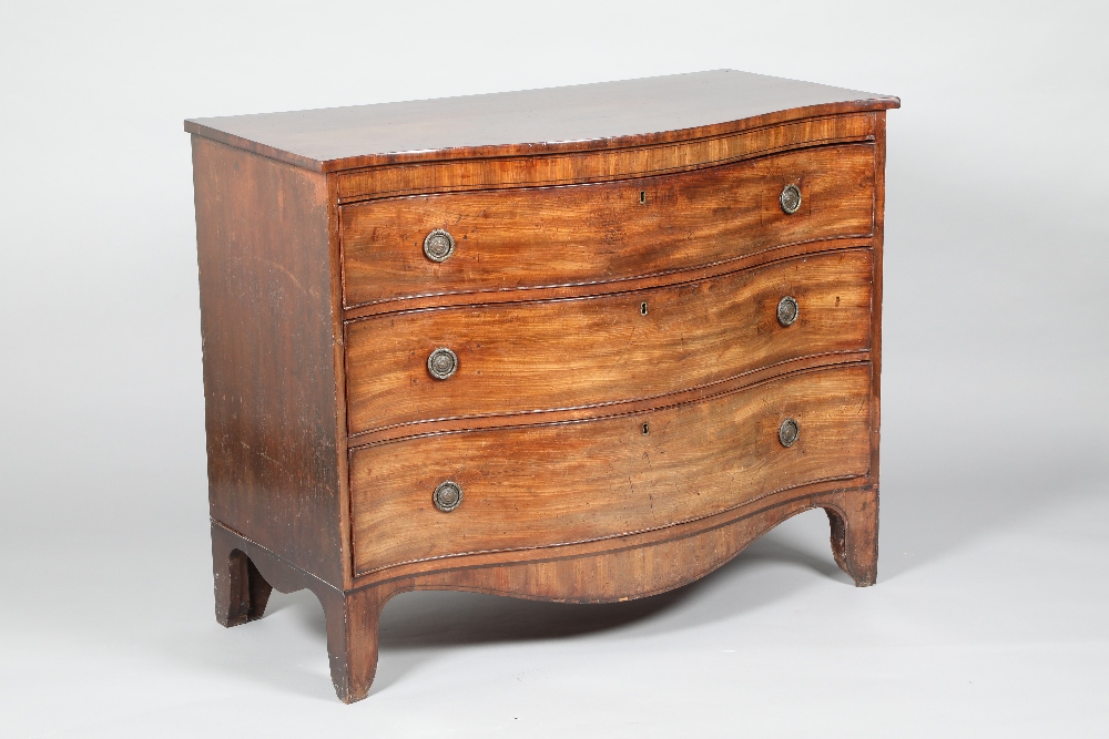 Victorian mahogany three drawer serpentine fronted chest, 140.5cm long 59cm wide 91cm high