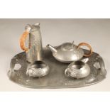 Archibald Knox pewter tea service with tray, designed for Liberty & Co pattern 0231 comprising of