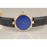 Must de Cartier silver gilt wrist watch with blue dial. Gilt hands, sapphire crown with leather