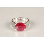 18ct white gold ruby ring, reversible ring which is set with a small cabochon emerald on the