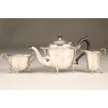 Three piece silver tea service, consisting of teapot, sugar basin and cream jug.
