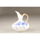 Royal Worcester China works ewer, squat form, hand painted with blue roses. Date coded 1897. 15cm