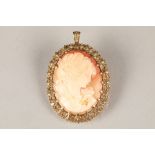 9 carat gold mounted cameo brooch, oval form, carved classical lady. Total weight 11.5g. 44mm x