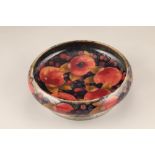 William Moorcroft pottery Tudric mounted bowl, for Liberty & Co, London, pomegranate pattern, pewter