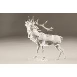 Swarovski crystal figure, 'Roaring Stag' boxed. 13.5cm long 14cm high