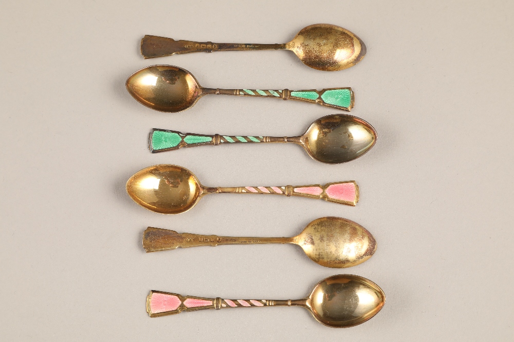 Boxed set of six silver gilt and enamel coffee spoons. Assay marked Birmingham 1952