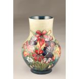 Moorcroft pottery vase, spring flowers pattern. 25.5cm high