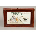 20th century Chinese ceramic plaque, figures bearing gifts for a mythical creature emerging from