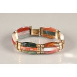 Ladies multicoloured three strand agate bracelet, mounted in yellow metal. 18.5cm long