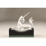 Swarovski crystal figure, Unicorn, with boxed collectors stand. 13.5cm long 11cm high
