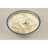 Early 20th century French Longwy Faience footed bowl, interior decorated with a duck and flowering