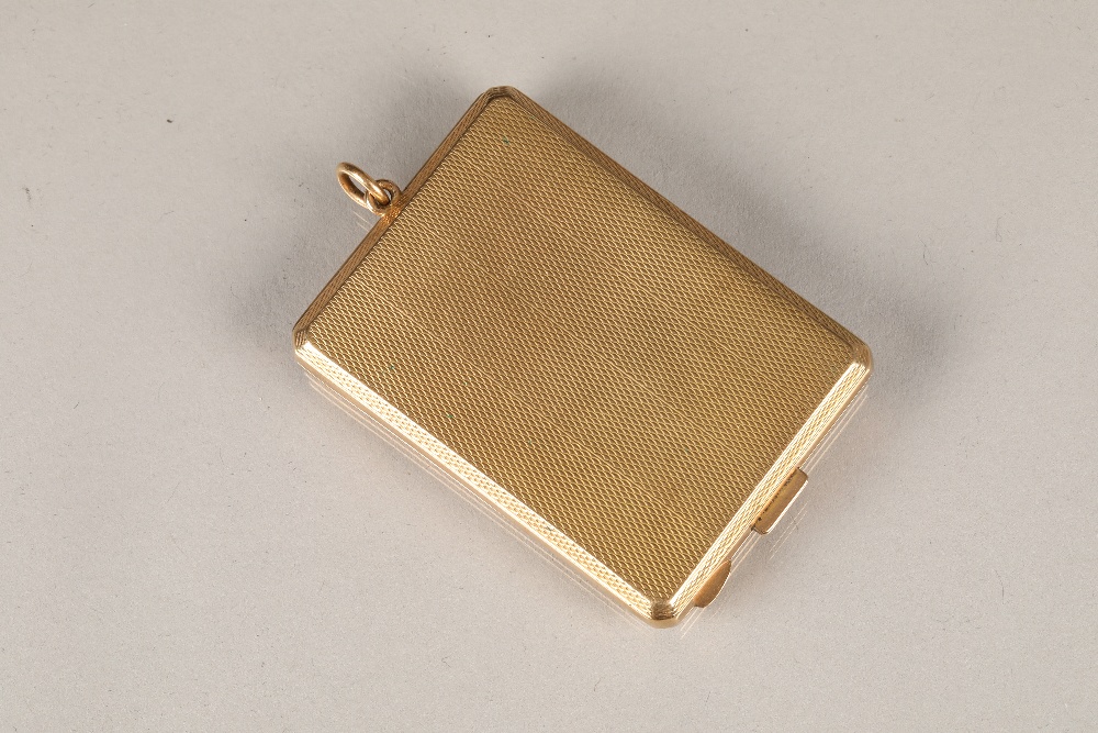 9 carat gold vesta case, rectangular shape with engine turned decoration and thumb ring attachment