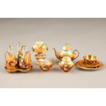 Six piece Caverswall bone china miniature tea set, a Caverswall miniature bone china lamp and