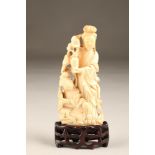 Japanese carved ivory group, two figures, one holding a vase with trailing plant. (Damage to base)