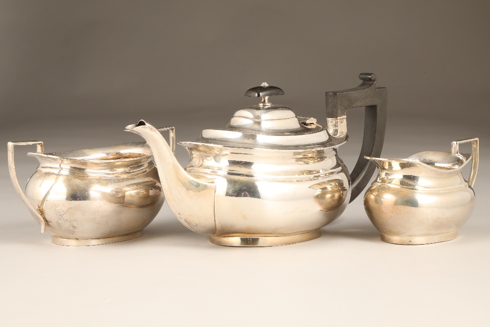 Three piece silver tea service, comprising of teapot, sugar basin & cream jug.