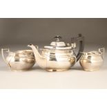 Three piece silver tea service, comprising of teapot, sugar basin & cream jug.