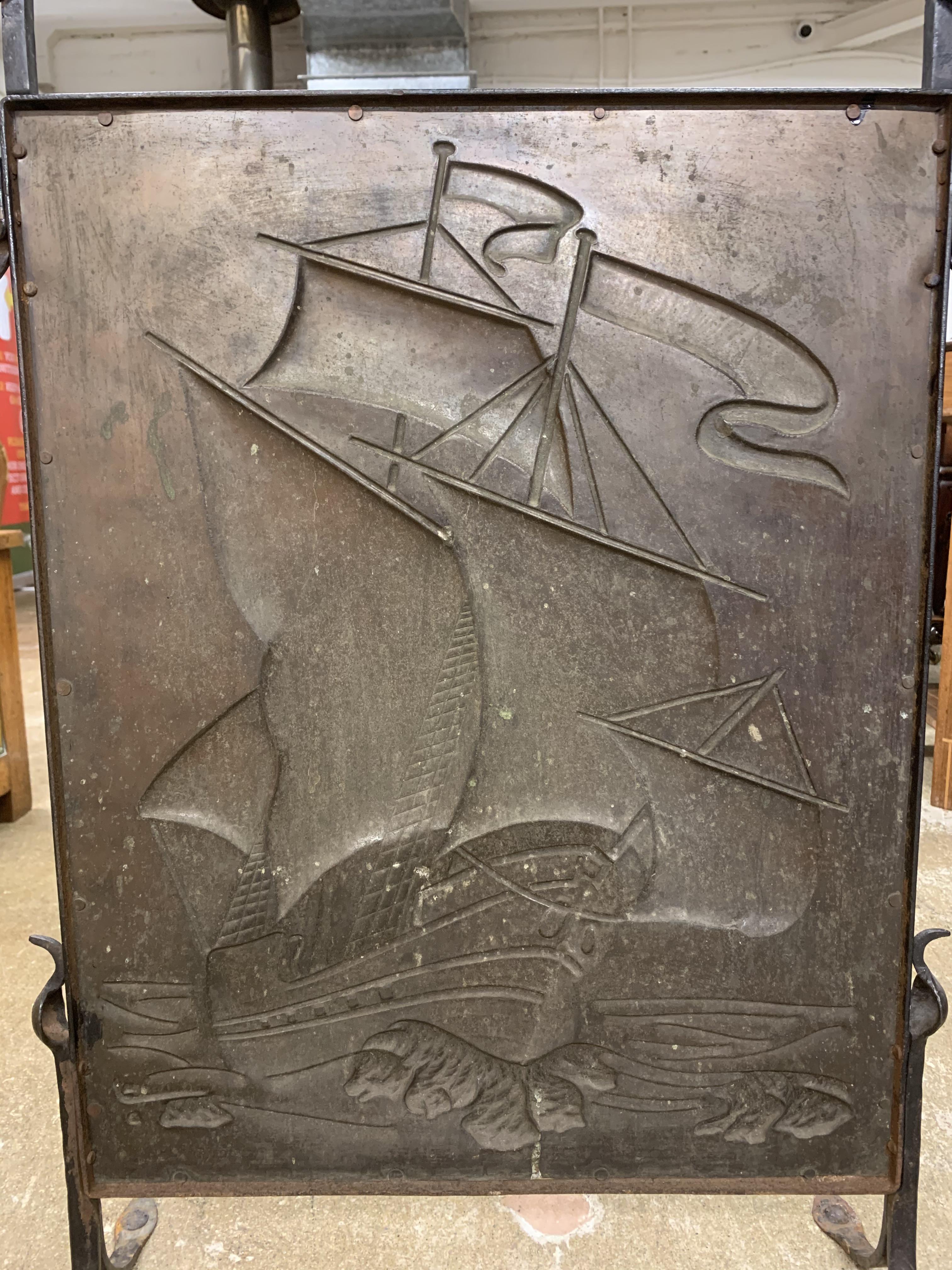 Arts & Crafts fire screen, wrought iron frame with an embossed ship copper panel. 61cm wide, 84cm - Image 3 of 7