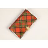 Mauchline tartan ware notebook, Clan Stuart tartan, gilt metal clasp; leather bound. 12cm high 7cm