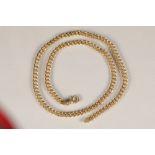 18 carat gold curb necklace. 65cm long. Total weight 81.6g
