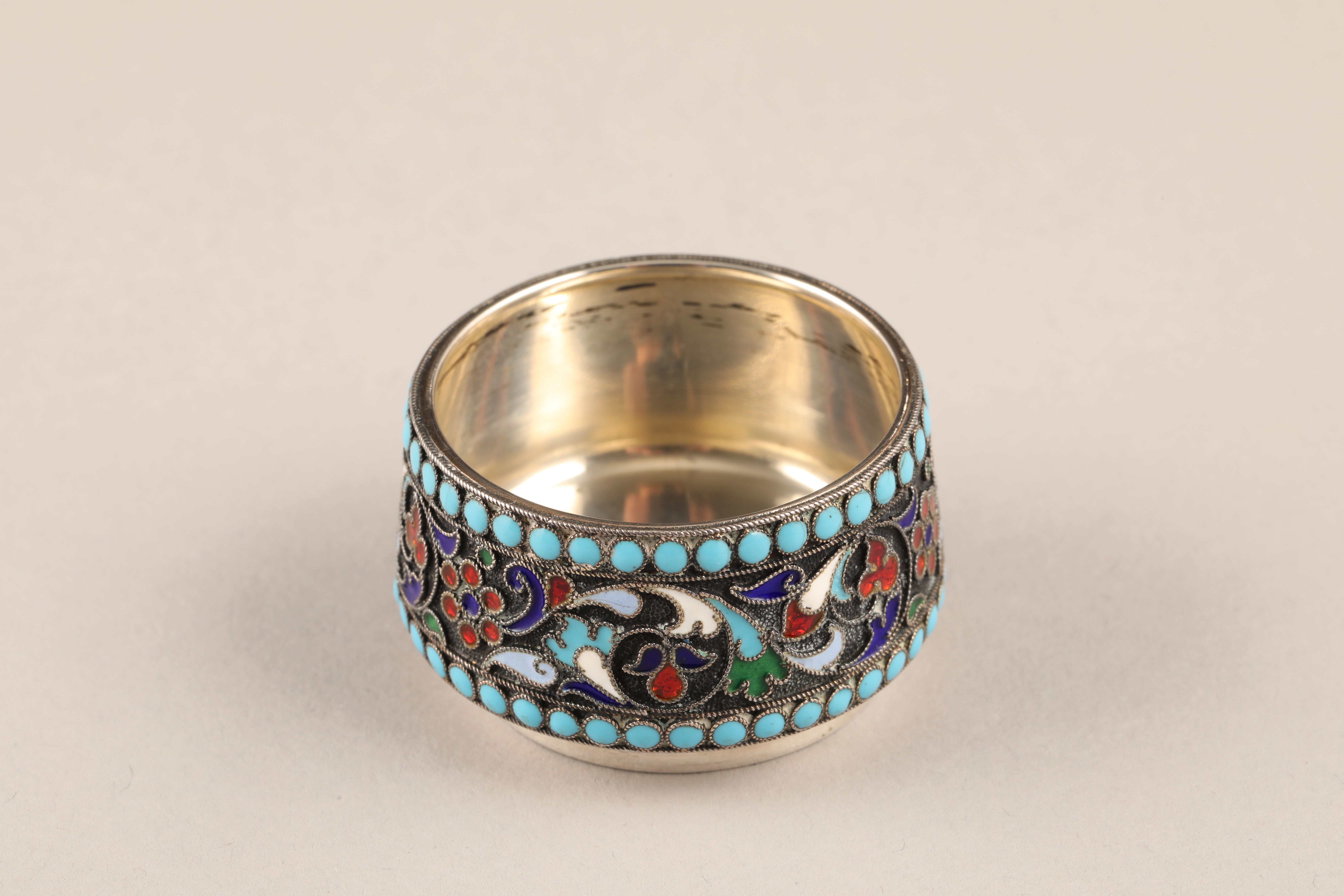 Imperial Russian silver and enamel circular salt, blue bead borders, sides decorated with flowers