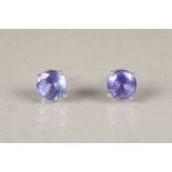 Pair of ladies round tanzanite earrings, violet blue colour, approx. tanzanite weight 2.5 carats.