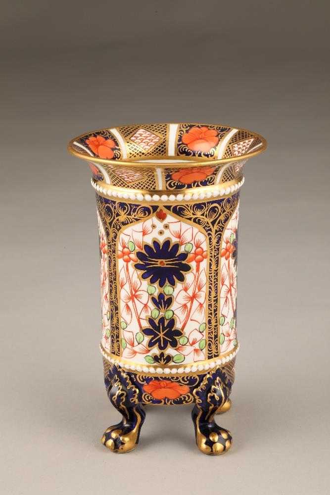 Royal Crown Derby vase of cylindrical form, raised on four paw feet, imari pattern. 17cm high