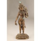 Tibetan bronze figure of a Buddha standing. Height 43cm