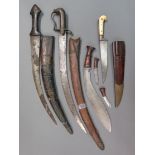 ˜AN INDIAN DAGGER (KARD) AND THREE FURTHER DAGGERS, 19TH AND 20TH CENTURY