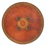 AN INDIAN LACQUERED HIDE SHIELD (DHAL), 19TH CENTURY