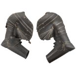 A PAIR OF SOUTH GERMAN OR SWISS PAULDRONS AND VAMBRACES, CIRCA 1590