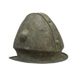 **A RARE NORTHWEST ITALIC BRONZE HELMET OF MONTELPARO TYPE, 6TH CENTURY B.C.