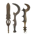 **TWO AFRICAN SICKLE-SHAPED SHORTSWORDS (NGOMBE DOKO) AND A BROADSWORD (DOKO MOBAMPA), CONGO, LATE 1