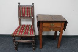 An antique oak dining chair upholstered in striped fabric together with a 19th century flap sided