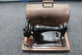 A mid 20th century cased Singer sewing machine