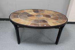 An oval Danish tiled coffee table