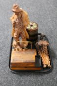 A tray of wooden pieces to include a biscuit barrel, carved table box, letter rack,