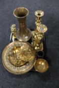 A tray of ornamental and decorative brass ware, large candlesticks,