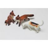 Two Beswick foxes and a Beswick beagle