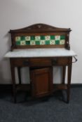 An oak Arts & Crafts marble topped tiled wash stand CONDITION REPORT: This measures