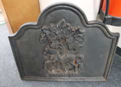 An antique cast iron fire place back depicting a horse CONDITION REPORT: In good