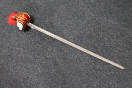 A reproduction basket-hilted sword