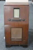 An early twentieth century walnut cased HMV floor standing valve radio