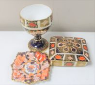 A Royal Crown Derby goblet 1128 together with trinket pot and gilded dish