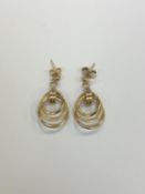 A pair of 9ct gold earrings CONDITION REPORT: 2.