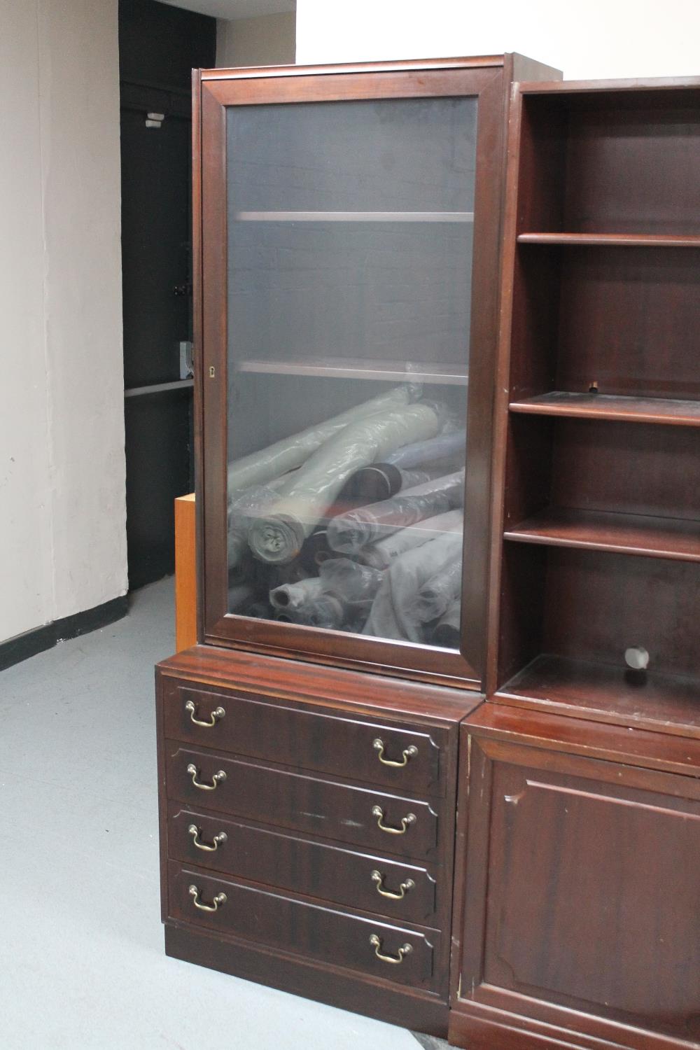 A glazed door mahogany display cabinet